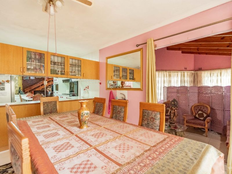 Spacious 7-Bedroom Home with Multiple Living Options in Reservoir Hills - Photo 7