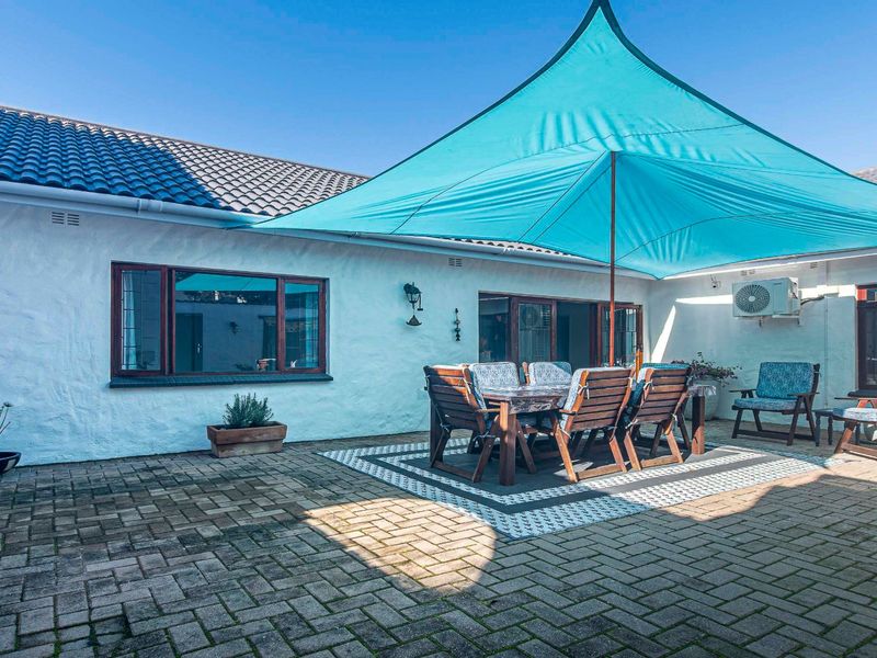 Charming Recently Renovated Knysna Home in Costa Sarda - Photo 7