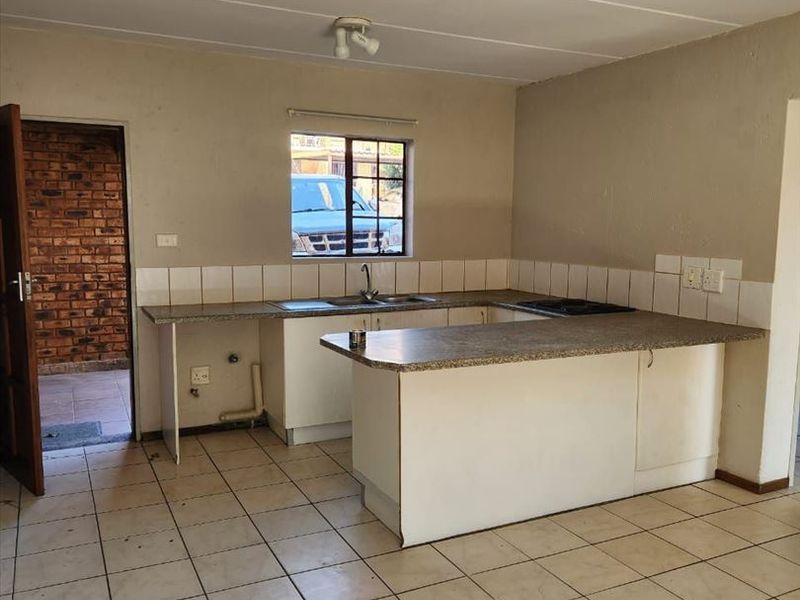 Charming Two-Bedroom Home with Great Value - Photo 1