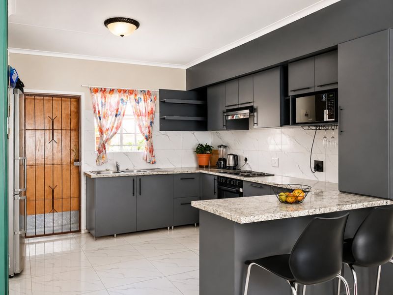 Charming 2-Bedroom Home in a Secure & Peaceful Setting - Photo 5