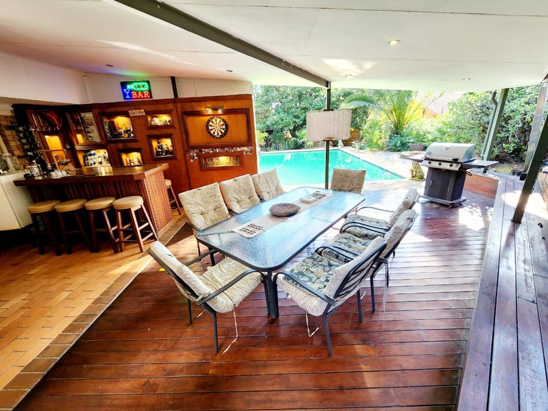 Spacious Rooihuiskraal home with pool and braai - Photo 3