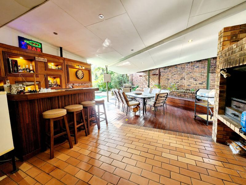 Spacious Rooihuiskraal home with pool and braai - Photo 4