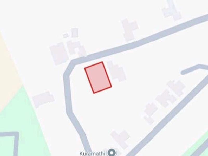 A map-based aerial view highlighting the location and boundaries of the vacant residential land plot.
