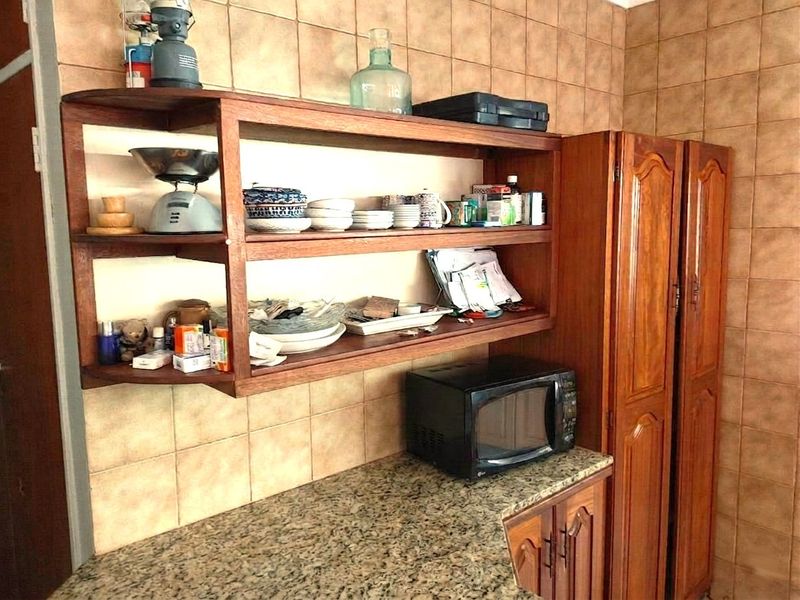 Spacious Family Living with a Borehole, Sparkling Pool & Tranquil Garden Oasis in Amandasig - Photo 7