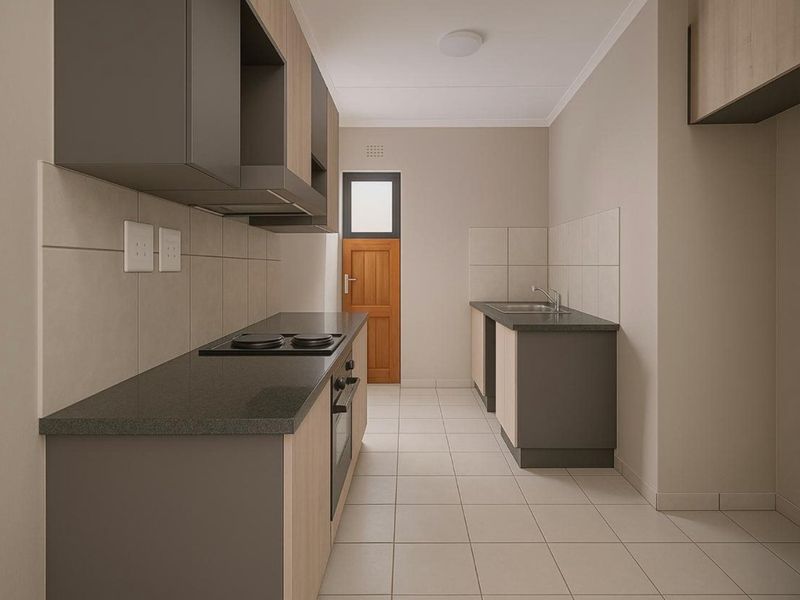 A modern, clean-lined kitchen featuring neutral cabinetry, stone countertops, integrated hob and oven, and tiled finishes throughout.