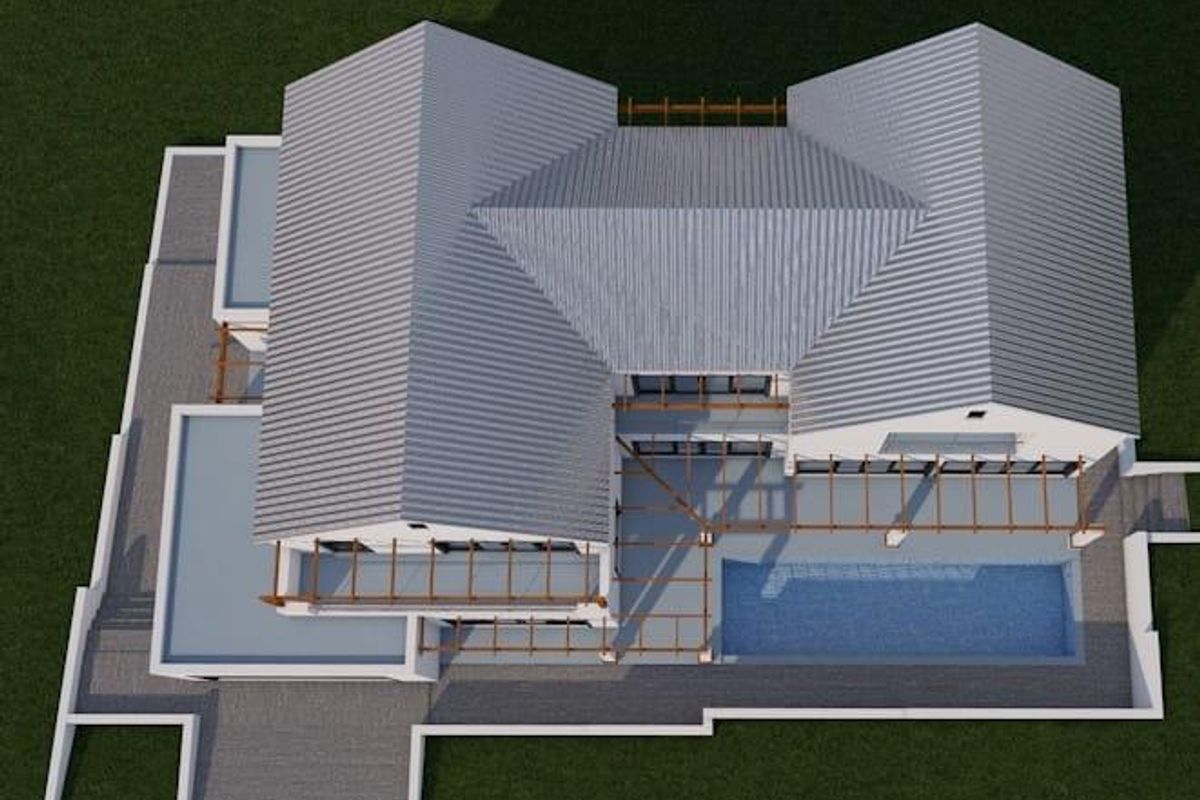 Aerial view of a residential property featuring a metal roof, swimming pool, and pergola-covered patio area.
