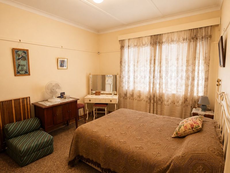 Spacious Family Home on a Large 1,380m2 Stand in Stilfontein Ext 3 - Photo 8