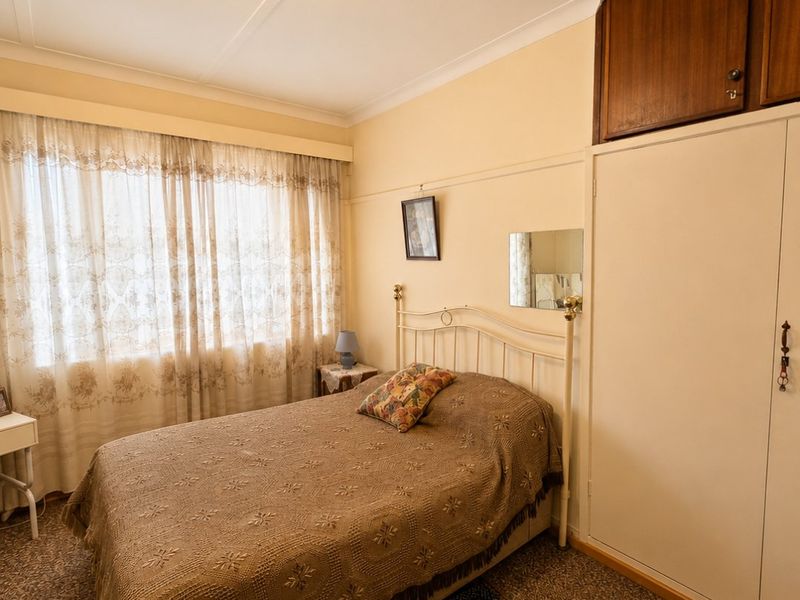 Spacious Family Home on a Large 1,380m2 Stand in Stilfontein Ext 3 - Photo 7