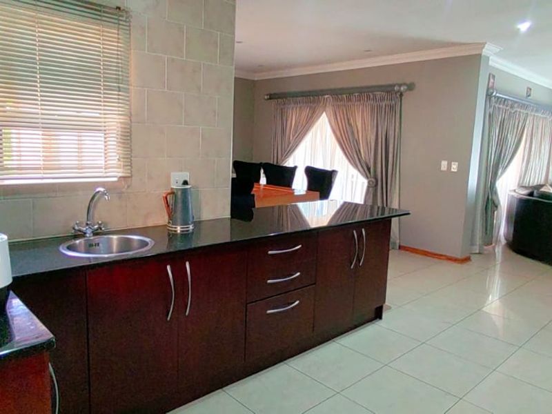 Spacious Six Bed Home in the Secure Vanderbijlpark Estate - Photo 3