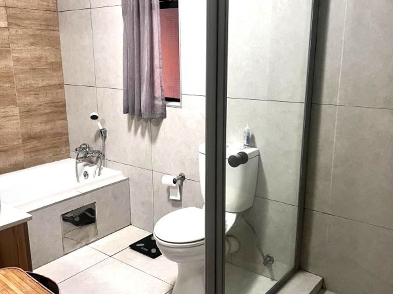 Modern 1-Bedroom Gem with Private Garden & 24-Hour Security! - Photo 8