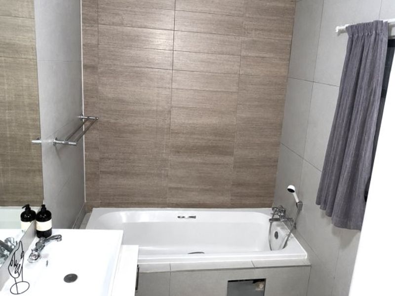 Modern 1-Bedroom Gem with Private Garden & 24-Hour Security! - Photo 7