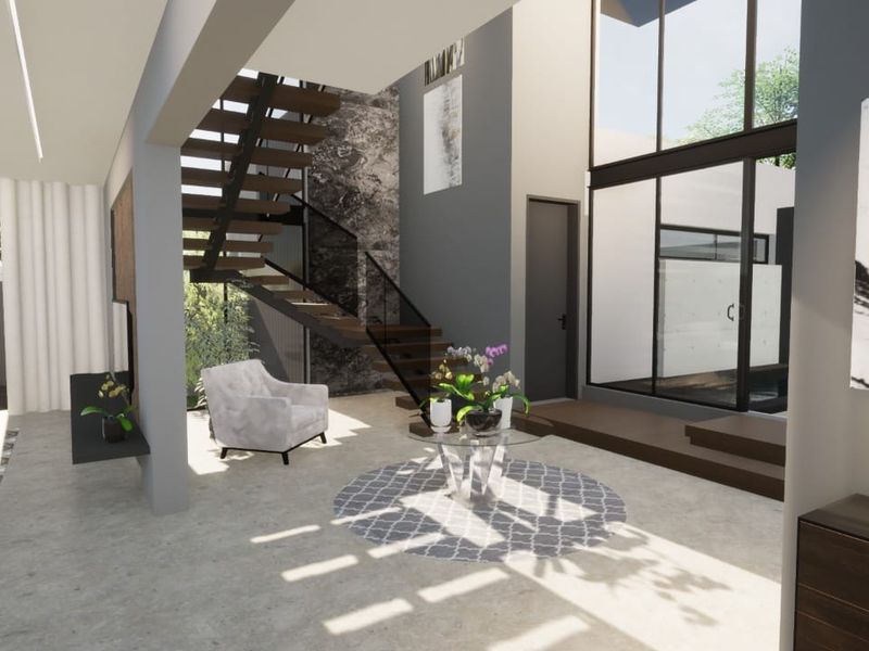 Modern open-plan living area featuring a striking floating staircase, floor-to-ceiling windows, and a sophisticated stone feature wall with polished concrete flooring.
