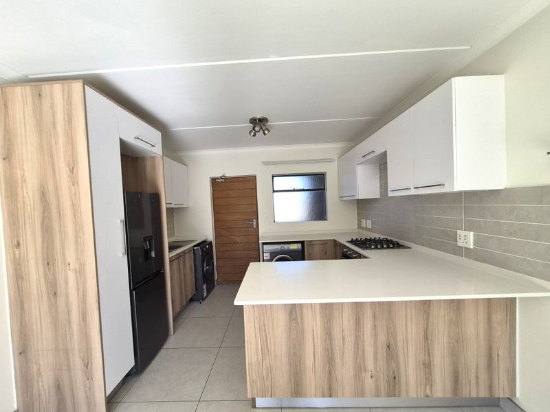 Stylish 1-Bedroom Townhouse with Private Garden & Pool Access - Photo 6