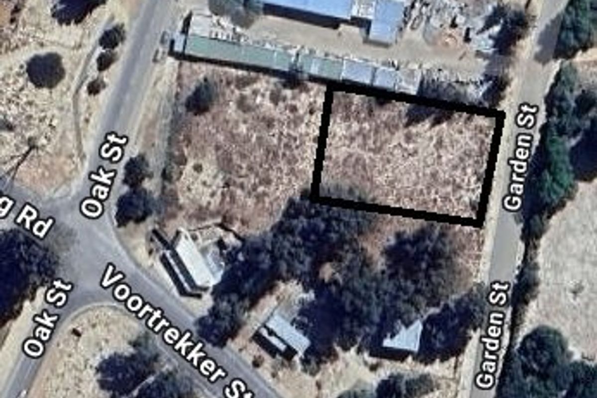 Aerial view of a vacant residential plot situated between Oak Street and Garden Street, offering clear access and development potential.