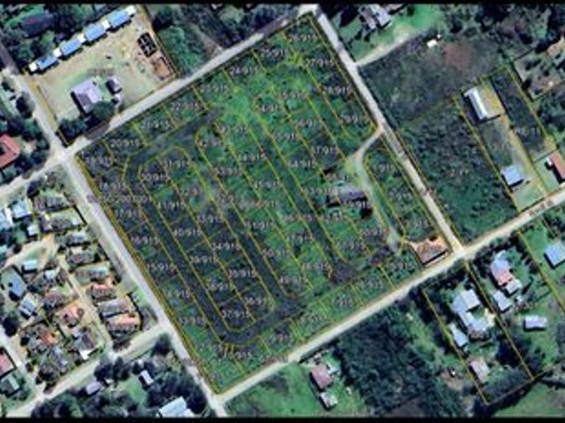 An aerial view showing the layout and boundaries of a residential land development site.