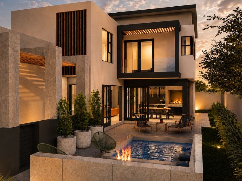 Modern rear exterior featuring a contemporary swimming pool, built-in fireplace, covered patio, and balcony, showcasing high-end architectural design and integrated outdoor lighting.