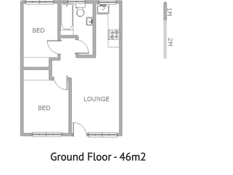 A clear floor plan diagram showing the layout of the 46m2 ground floor, including two bedrooms, a bathroom, and a lounge area.