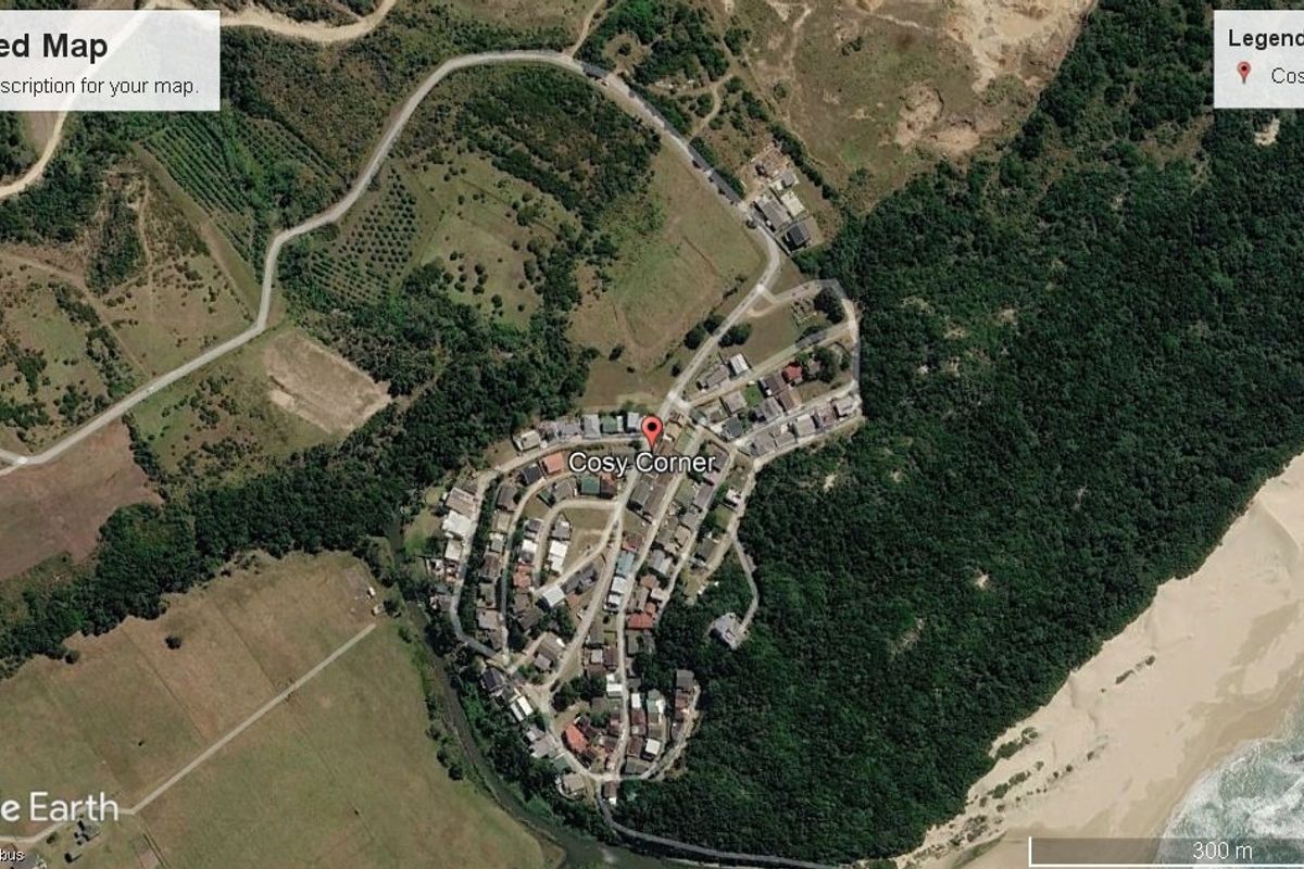 An aerial satellite view showing the residential area and surrounding landscape context of the property.