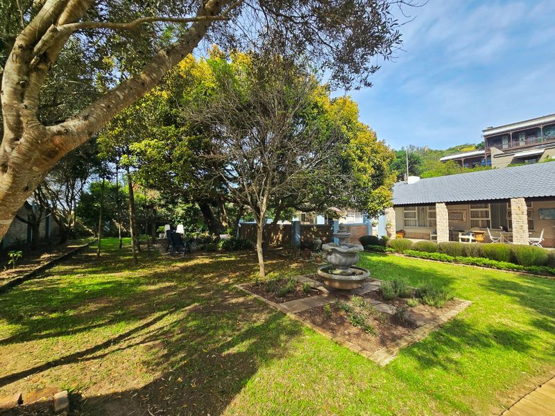 Spacious Wilderness Home for sale with Pool, Separate Cottage and Income-Generating Flatlet - Photo 3