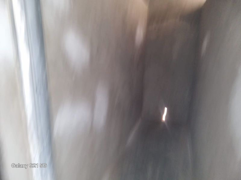 The image is too blurry and out of focus to identify any specific room or property features.