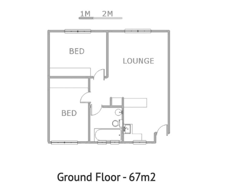 A clear floor plan diagram showing the layout of a 67m2 ground floor apartment with two bedrooms, a lounge, and a bathroom.