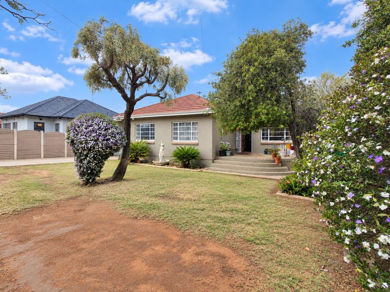 Sunny Germiston Home with Flatlet and Solar Power - Photo 2