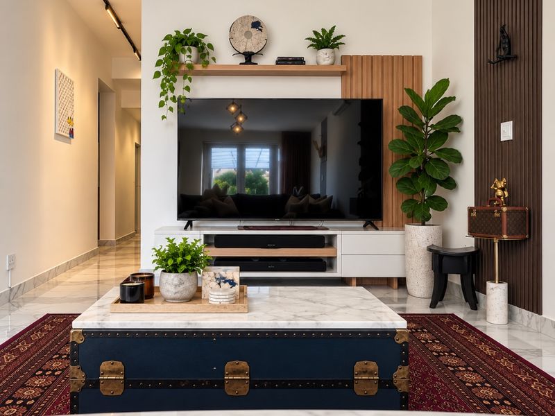Modern living room featuring a custom media wall with slatted wood accents, integrated shelving, and polished marble flooring.