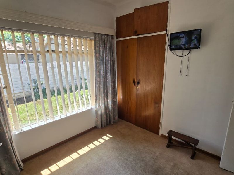This is a proper family home. Neat and spacious package in Stilfontein Extension 4. - Photo 10