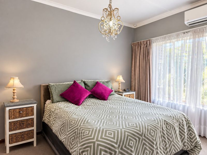 Spacious 5-Bedroom Family Home with Flatlet Potential | Stilfontein Ext 4 - Photo 3