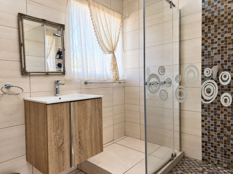 Spacious 5-Bedroom Family Home with Flatlet Potential | Stilfontein Ext 4 - Photo 10