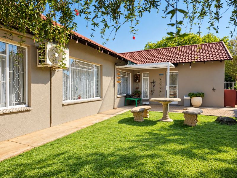 Spacious 5-Bedroom Family Home with Flatlet Potential | Stilfontein Ext 4 - Photo 2