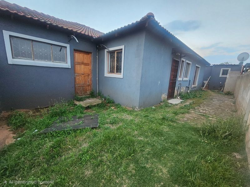 Rear exterior view of the property featuring a tiled roof, security gates, and a paved walkway, requiring maintenance to the exterior walls and garden.