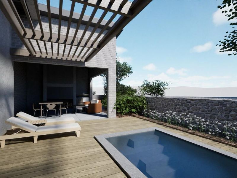 Outdoor entertainment area featuring a covered pergola, built-in fireplace, timber decking, and a modern plunge pool set against a stone retaining wall.