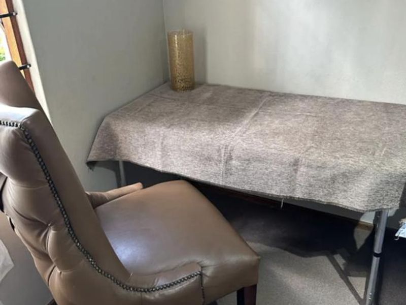 A small corner space suitable for a home office or study area with neutral wall finishes.