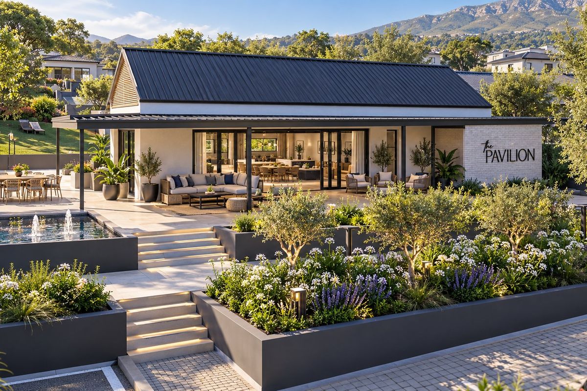A beautifully landscaped rear exterior featuring a modern pavilion with a covered patio, swimming pool, and tiered garden beds against a mountain backdrop.
