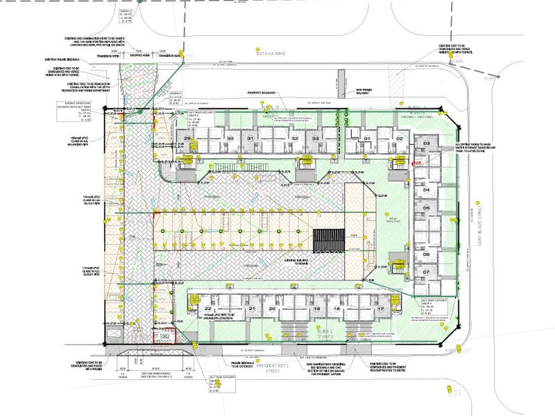 Architectural site plan detailing the layout, boundaries, and infrastructure for the apartment complex development.