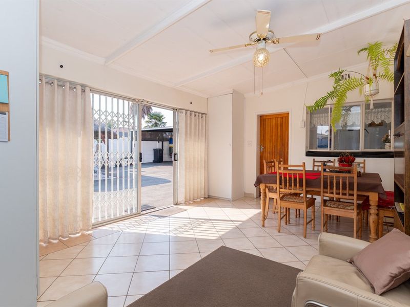 Charming 3-Bedroom Family Home with Secure Living - Photo 4