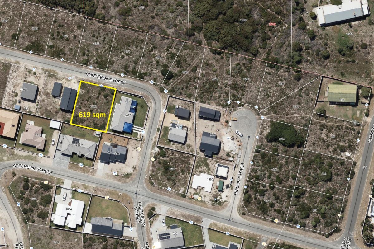 Aerial view of a 619 sqm vacant residential plot located on a corner in a developed neighborhood.