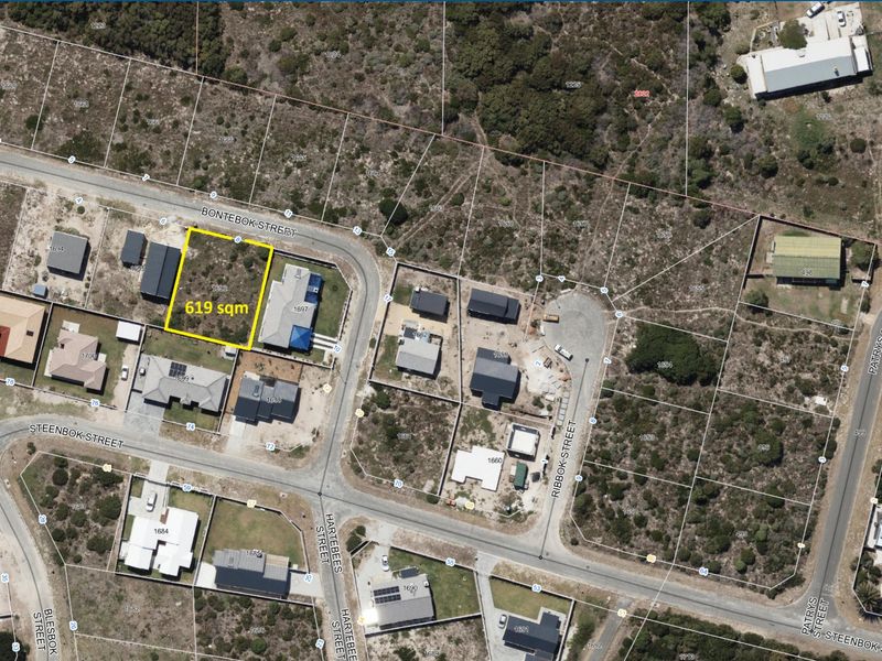 Aerial view of a 619 sqm vacant residential plot located on a corner in a developed neighborhood.