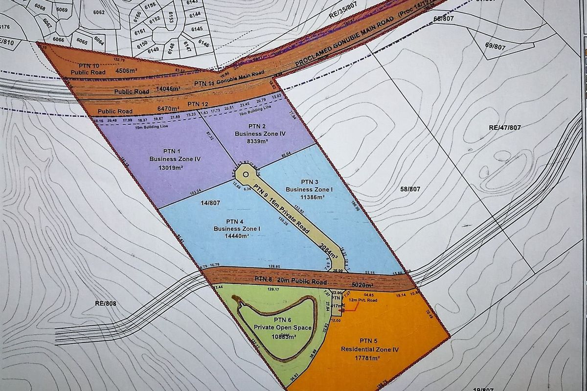 A detailed cadastral layout plan showing the subdivision of land parcels, including business zones, residential zones, and public road access.
