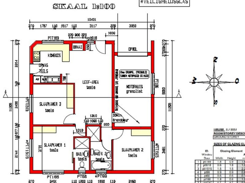Architectural floor plan showing the layout of a three-bedroom house including kitchen, living area, bathrooms, and garage.
