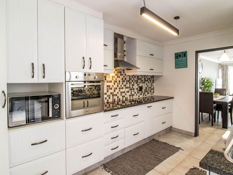 Spacious Family Duplex with Private Garden & Reliable Backup Power - Photo 5