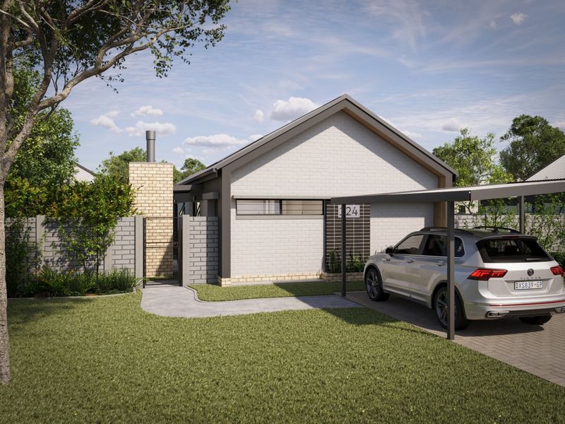 Modern single-story residential facade featuring a clean brick finish, a functional carport, and a well-maintained front garden area.