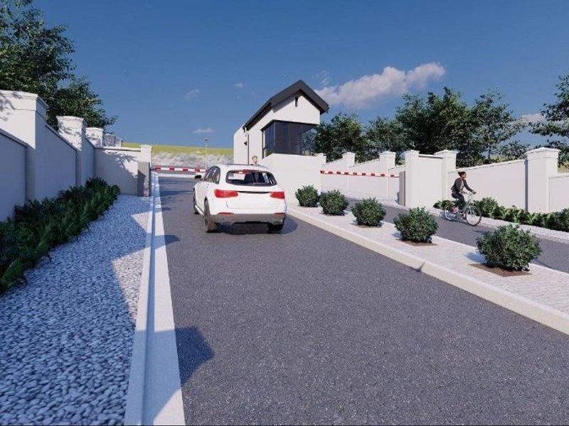 A digital rendering of a residential estate entrance featuring a security gatehouse, perimeter walling, and a paved driveway with boom gate access.