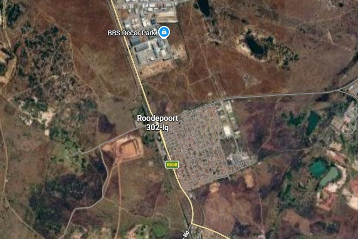An aerial satellite view showing the surrounding landscape and road infrastructure near the Roodepoort 302-Iq area.
