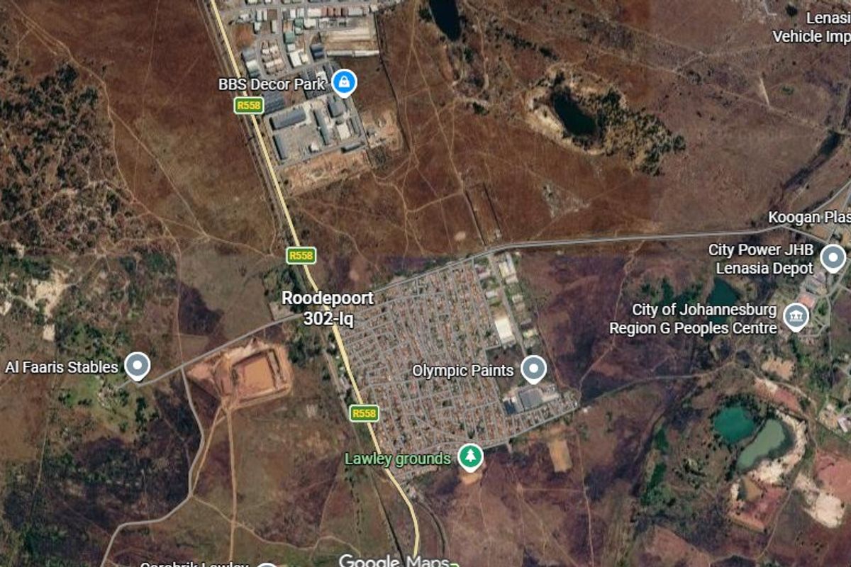 An aerial satellite view showing the surrounding area and infrastructure near the property location.
