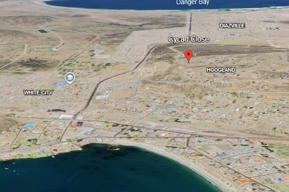 An aerial map view showing the location of the property in relation to the surrounding coastal town and bay area.