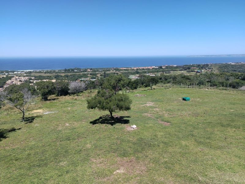 Elevated coastal view overlooking the surrounding landscape and ocean horizon.