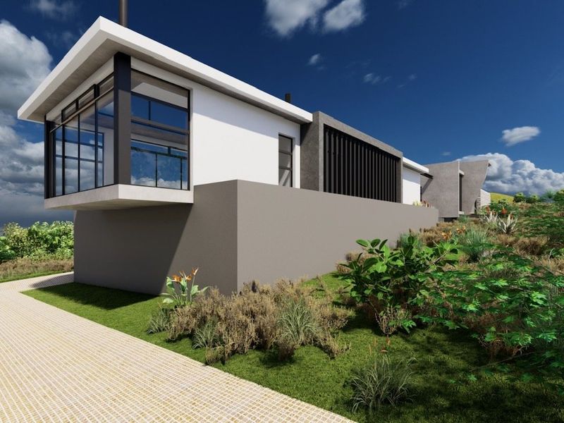 A modern residential exterior featuring clean lines, large glass windows, and a paved driveway set within a landscaped environment.