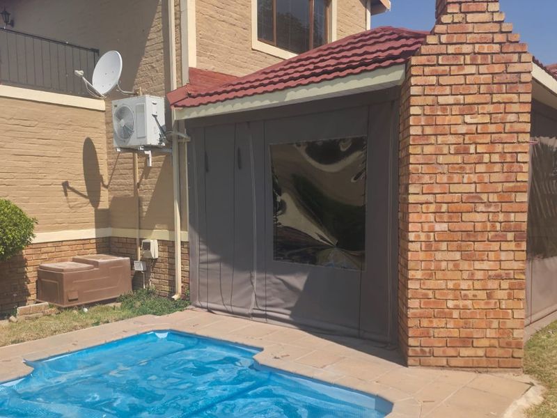 Exceptional 4-Bedroom Family Haven in Secure Estate - Photo 7